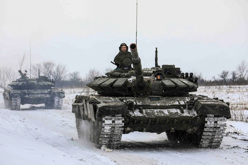 Russia says some troops near Ukraine returning to base