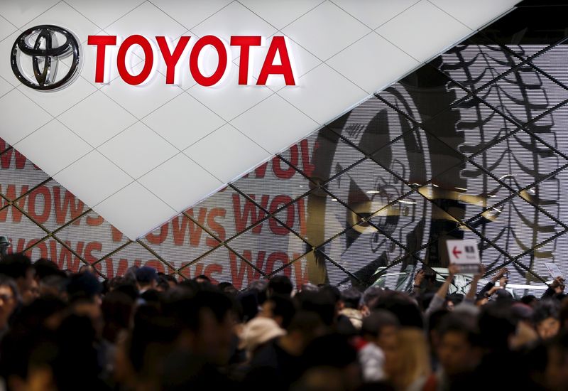 Toyota trims production target, posts Q3 profit fall amid chip crunch