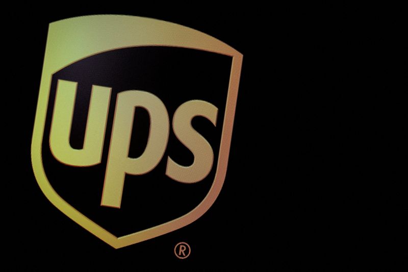 UPS delivers record earnings with rosy outlook, dividend hike; shares soar