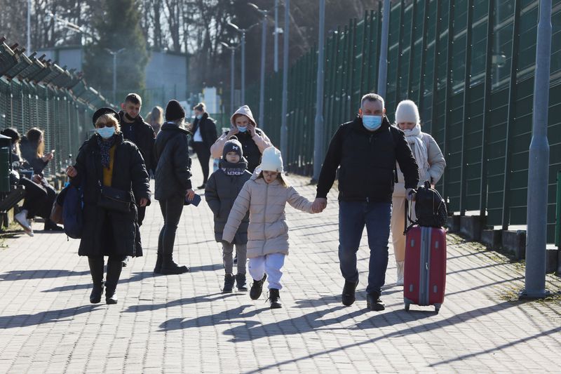'We pray for Ukraine', people flee war into central Europe