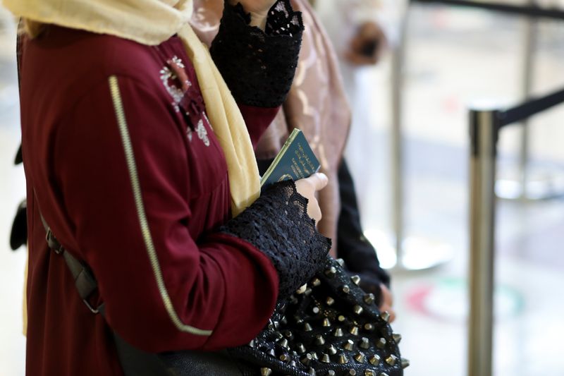 Afghanistan's Taliban ban women from flying without male chaperone - sources