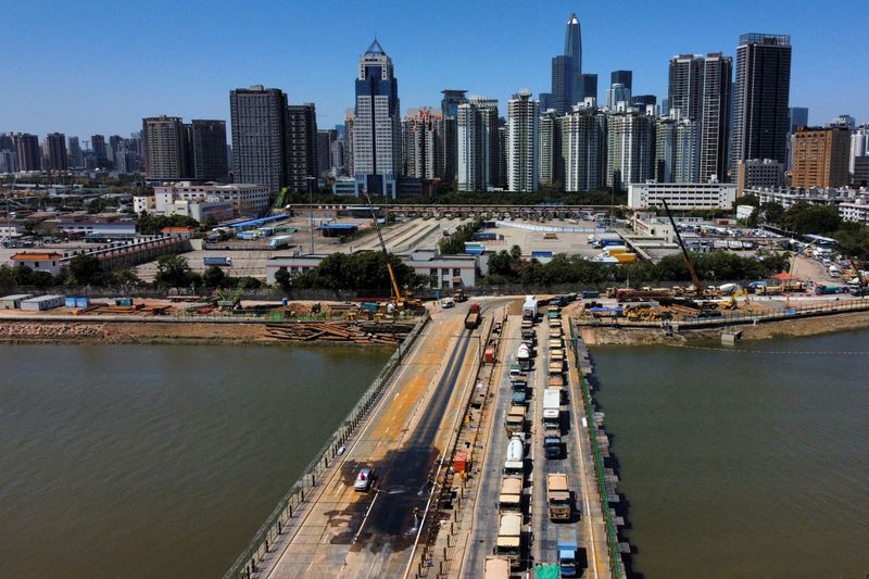 Analysis-Clear roadmap needed for Hong Kong's revival as COVID sweeps through city -experts