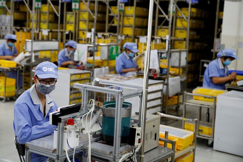 Asia's factory activity grows but Ukraine crisis clouds outlook