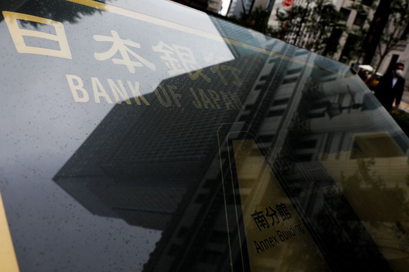 BOJ maintains huge stimulus, warns of growth risks from Ukraine crisis