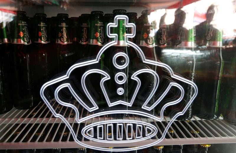 Carlsberg joins rival Heineken in quitting Russia, faces big hit