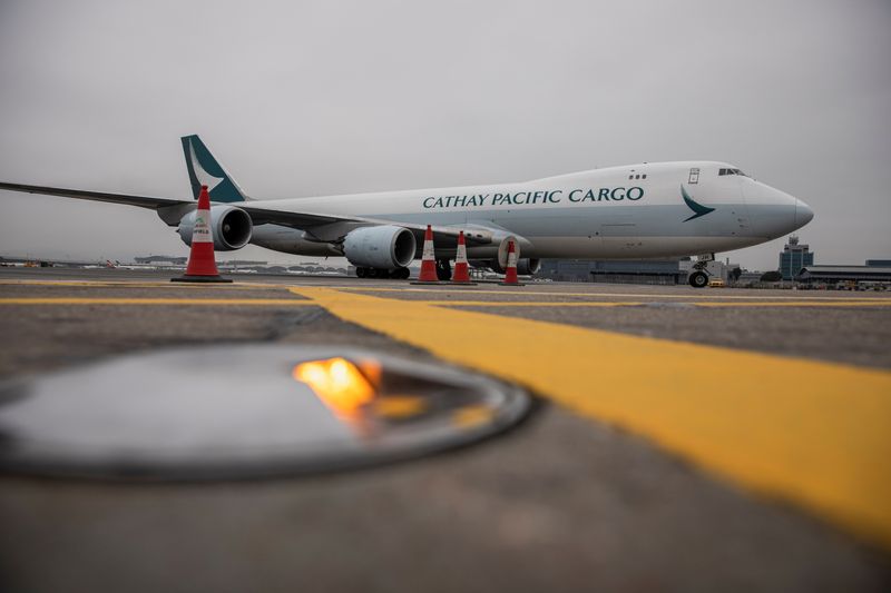 Cathay Pacific narrows annual loss on cost cuts, strong cargo demand