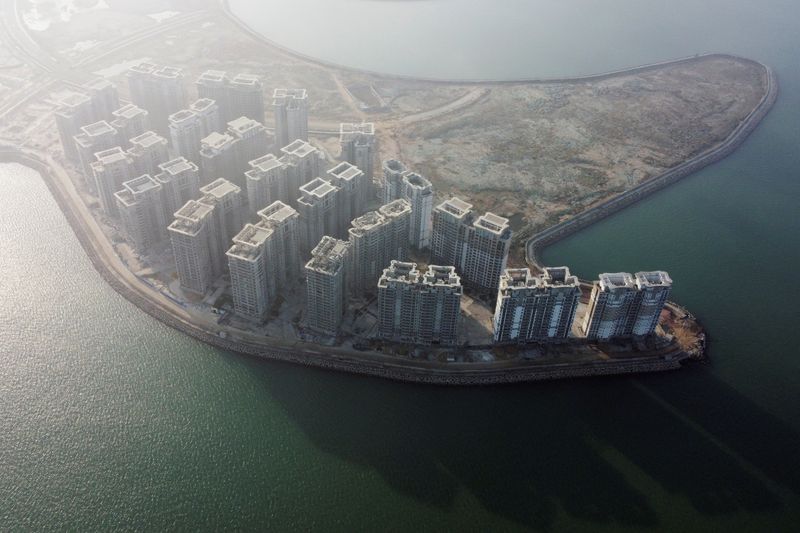 China Evergrande says unable to publish annual results by March 31