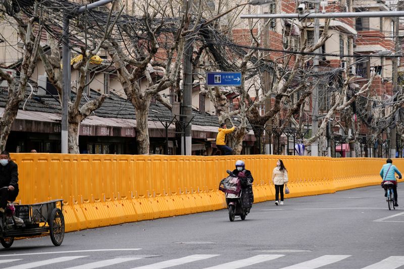 China's Shanghai denies lockdown rumours as COVID infections near 1,000