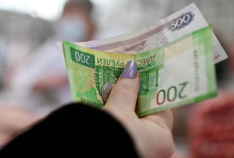 Analysis: Confusion, but not panic, reigns in global finance in Russia’s wake