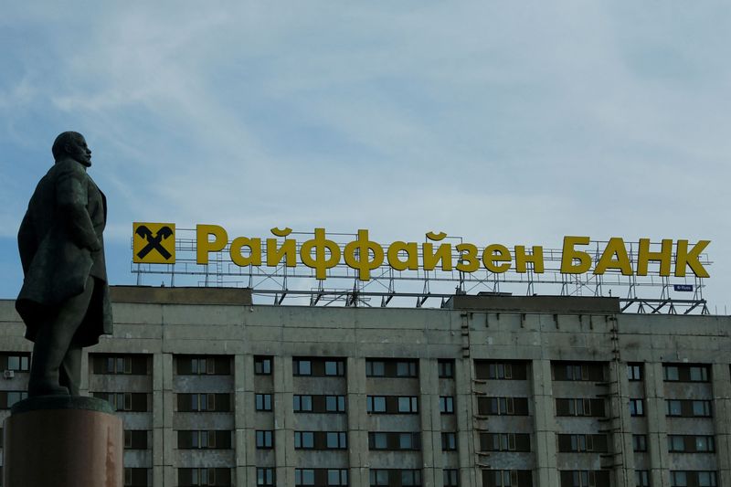 European bank shares slide further; Russia's Sberbank exits Europe
