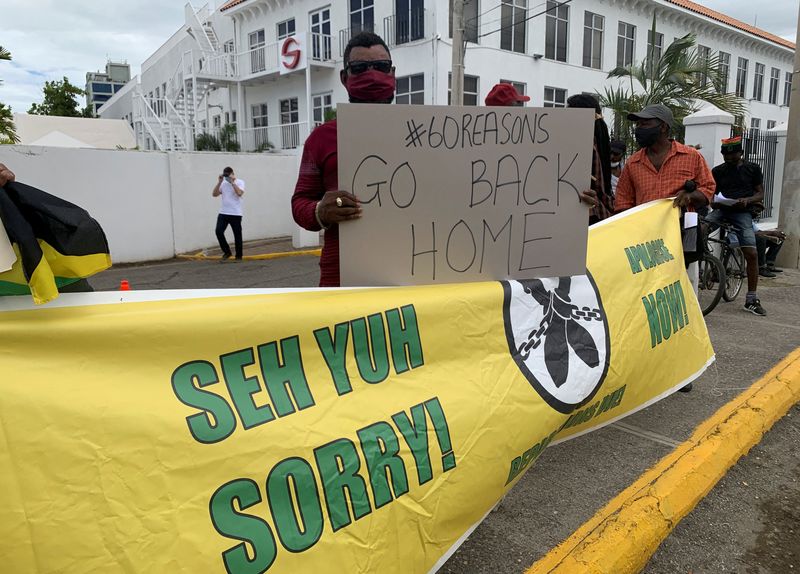 Jamaicans protest for slavery reparations ahead of visit by British royals