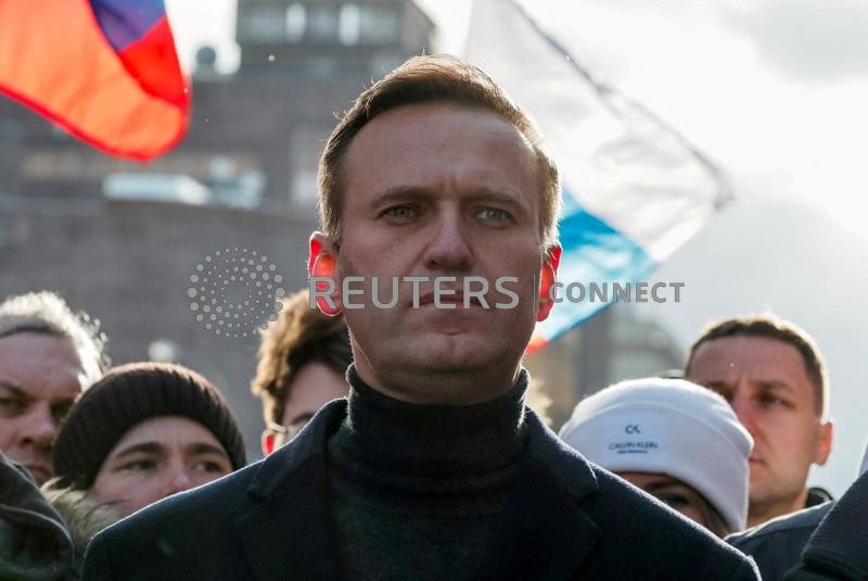 Russian court finds Kremlin critic Navalny guilty of fraud