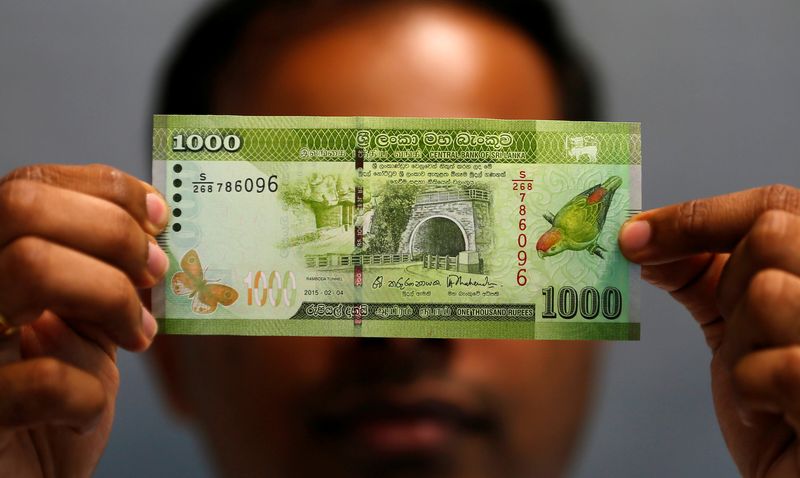 Sri Lanka to begin official talks with IMF next month as protests grow