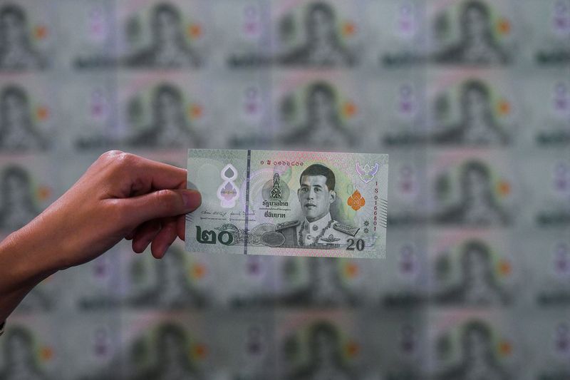 Thai central bank holds fire on rates as economic growth forecast lowered