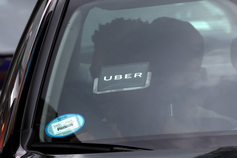 Uber reaches deal to list NYC taxis on app