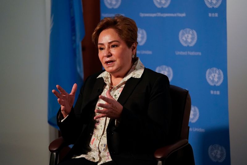 Exclusive-U.N. climate chief: Ukraine crisis must not delay global action