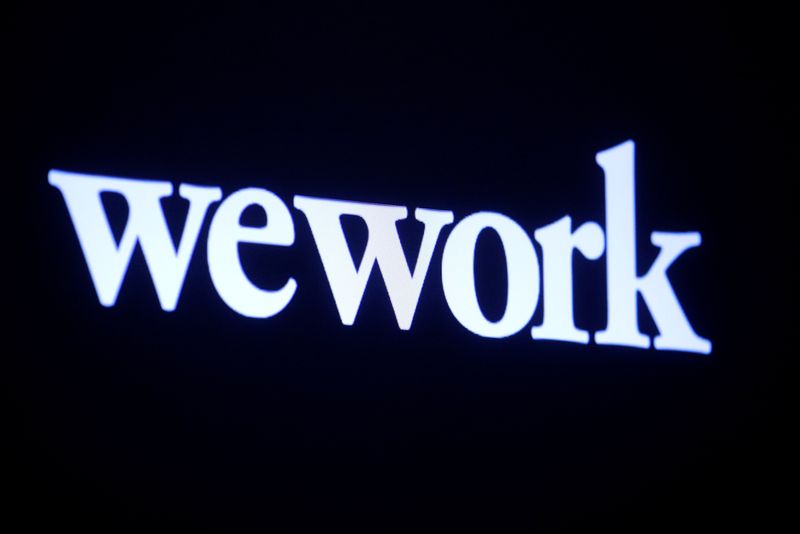 WeWork reports smaller fourth-quarter loss on cost cuts, office space demand