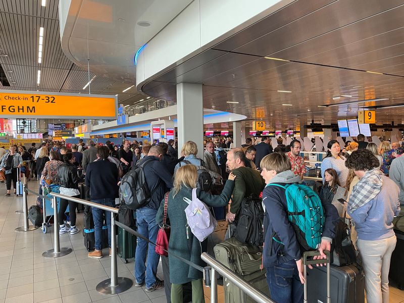 Amsterdam airport urges travellers to stay away as strike causes chaos