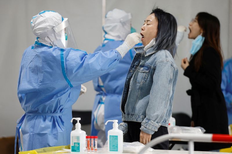Beijing presses on with mass COVID testing as locked-down Shanghai seethes