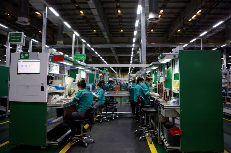 China should act to ease COVID impact, boost growth over 5% -central bank official