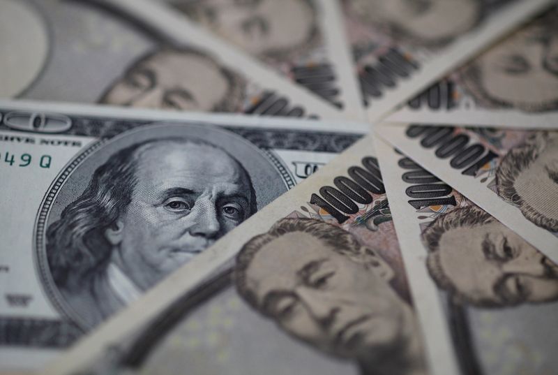 Dollar scales fresh two-decade peak to yen, BOJ targets yields