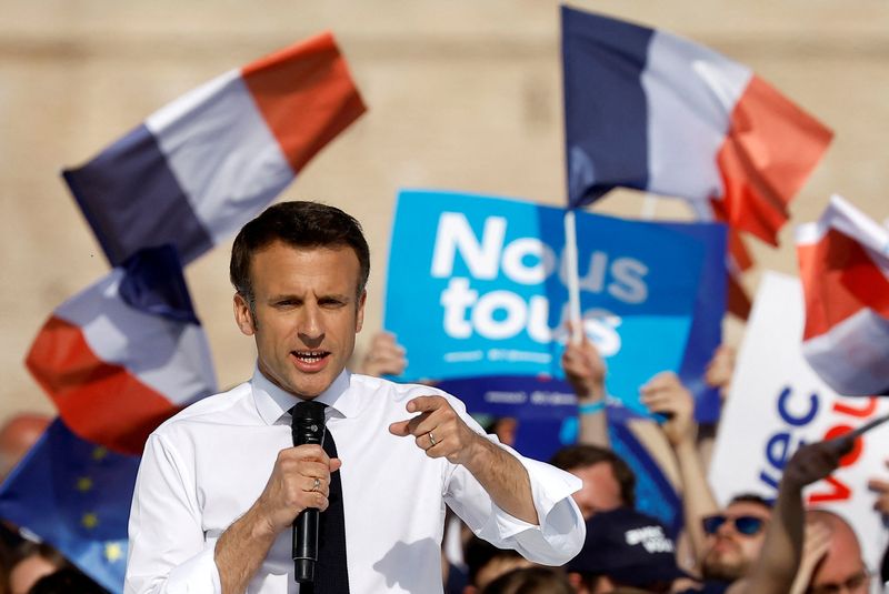 Eyeing green vote, Macron vows to exit oil, coal and gas