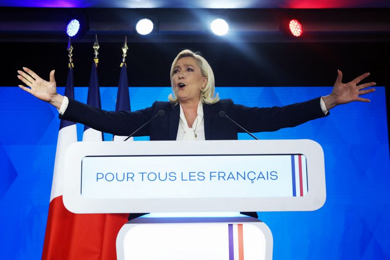Down but not out: France's Le Pen vows to fight on