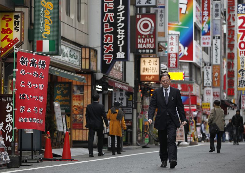 Japan's household spending up, outlook gloomy as price rises weigh