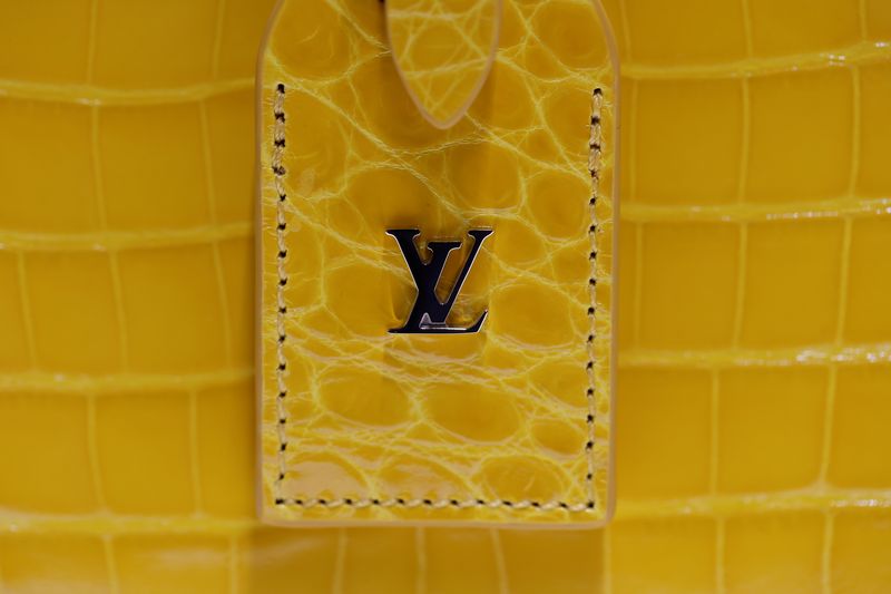 LVMH Q1 total revenue 18 billion euros vs yr ago 13.96 billion euros