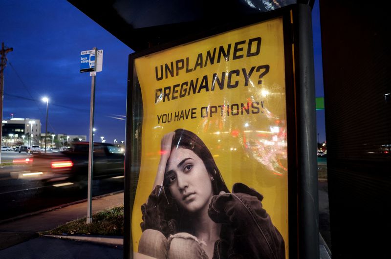 Oklahoma governor signs near-total abortion ban that threatens prison for providers