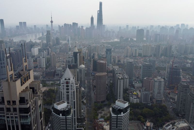 Shanghai COVID curbs prompt half of U.S. firms to cut revenue forecasts - survey