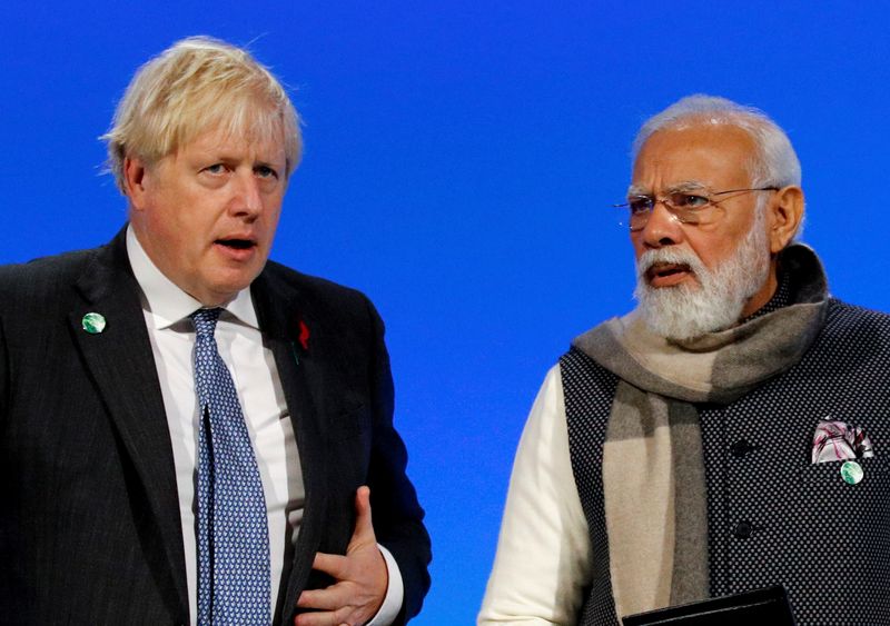 UK's Johnson to leave home woes behind in visit to India