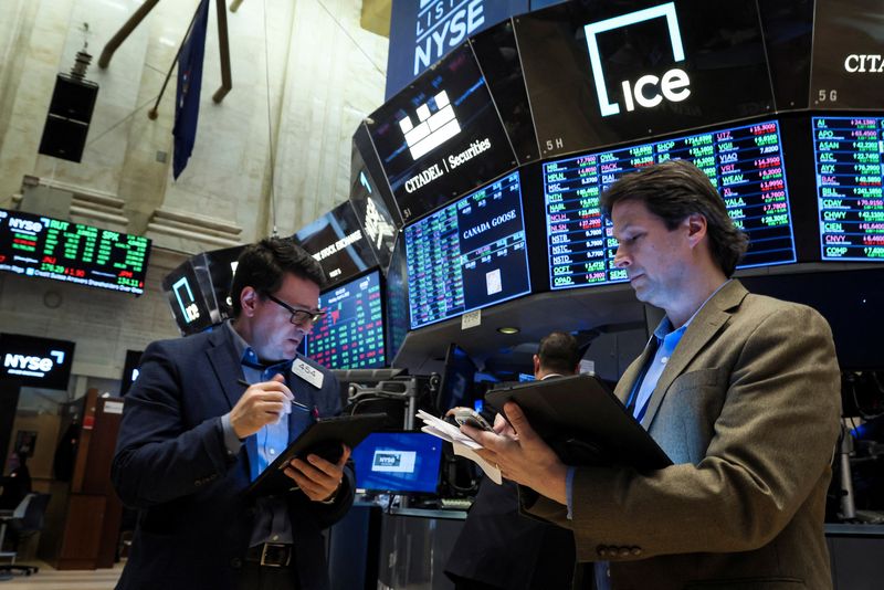 Wall St retreats on worries about hawkish Fed, fresh Russia sanctions