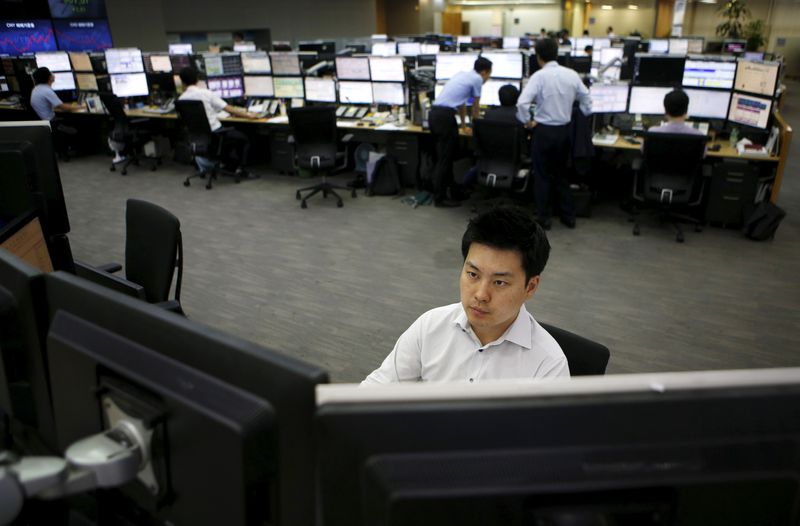 Asian shares inch up from near two-year lows ahead of U.S. inflation data