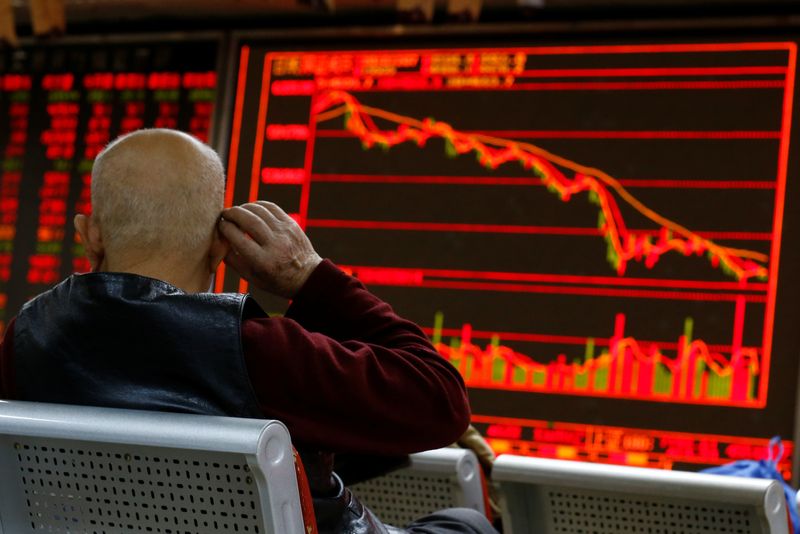 Asian shares tumble as global growth fears mount