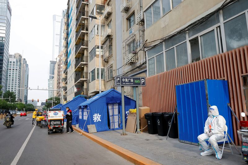Beijing works from home, Shanghai says victory against COVID getting closer
