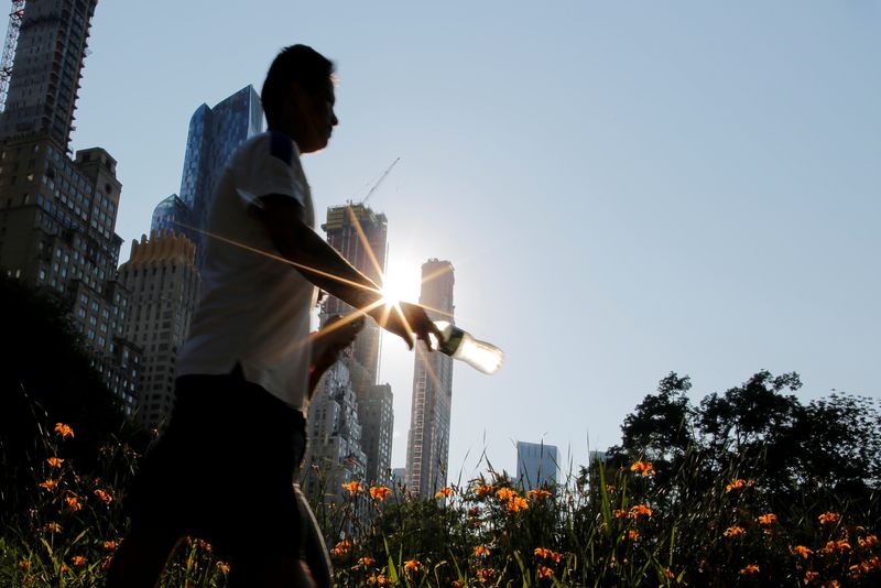 Early heat wave to bake U.S. East Coast as late snow blankets Denver