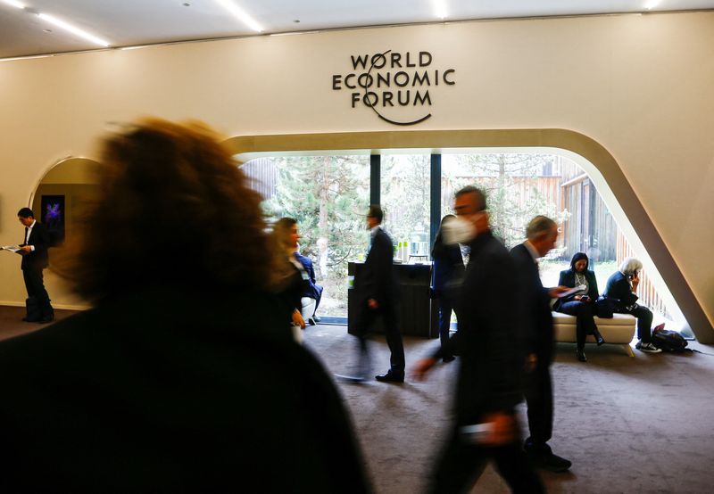 Economic storm looming, business and government leaders warn in Davos