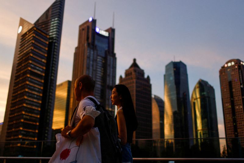 Exclusive-Shanghai's lockdown delays dollar buying, gives falling yuan reprieve
