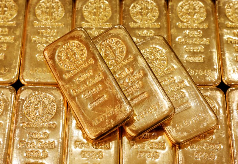 Gold hovers near 2-week peak as dollar, U.S. bond yields weaken