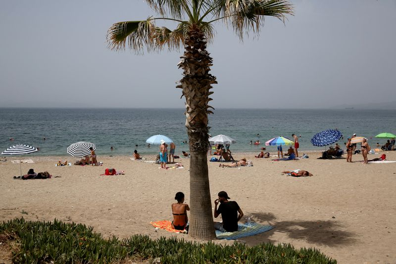 Greece lifts COVID curbs for travellers ahead of key summer season