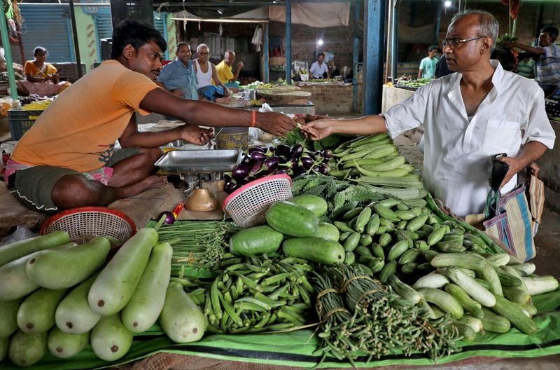 India's retirees tap savings, eat less as living costs soar