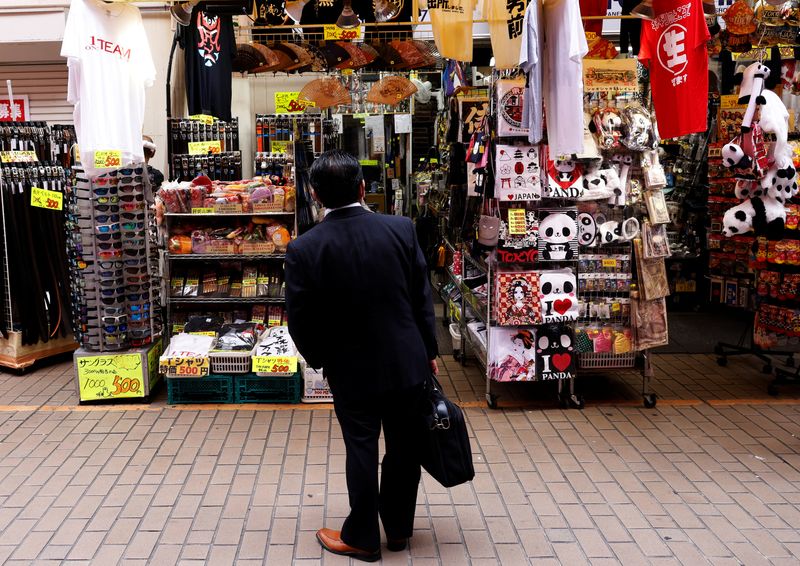 Japan govt to urge BOJ to meet price goal sustainably - policy draft
