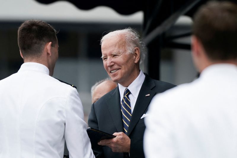 Keep the South China Sea free, Biden tells Navy graduates