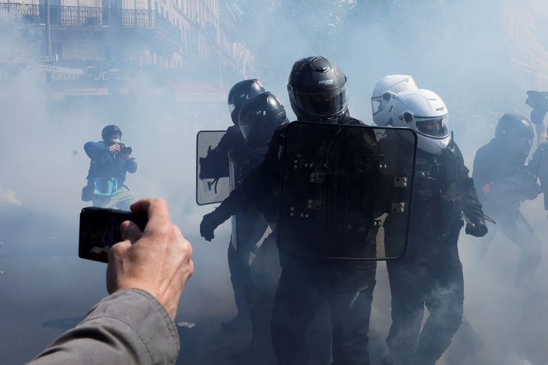 May Day marchers in France put pressure on re-elected Macron