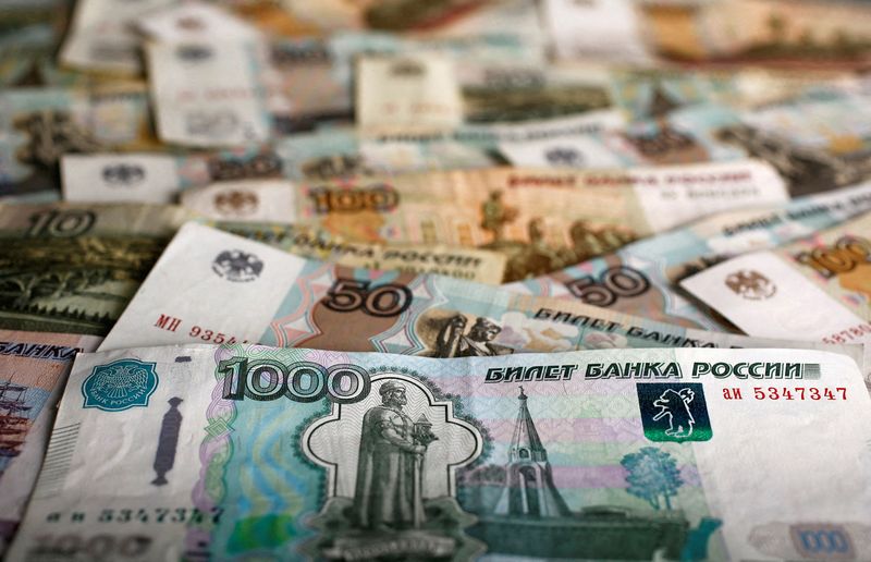 Russian rouble rallies past 60 vs dollar