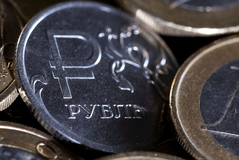 Russian rouble weakens as central bank cuts rates to 11%