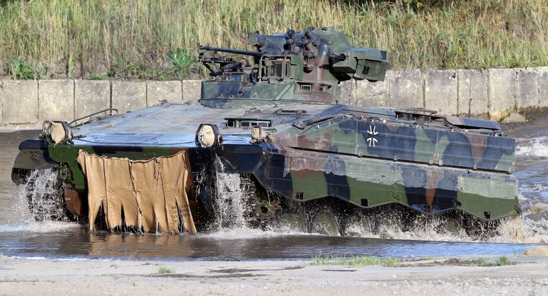 Scholz defends Germany's caution on sending heavy arms to Ukraine