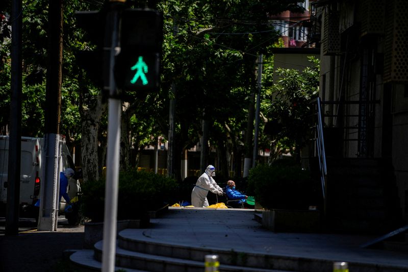 Shanghai tightens lockdown to hit zero-COVID goal by late May - sources
