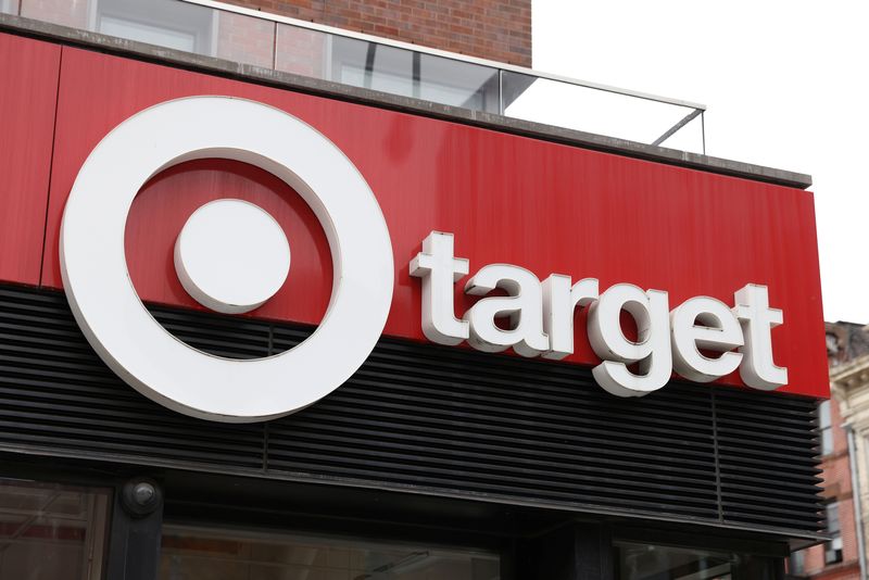 Target profit halves on rising costs, warns of bigger margin hit